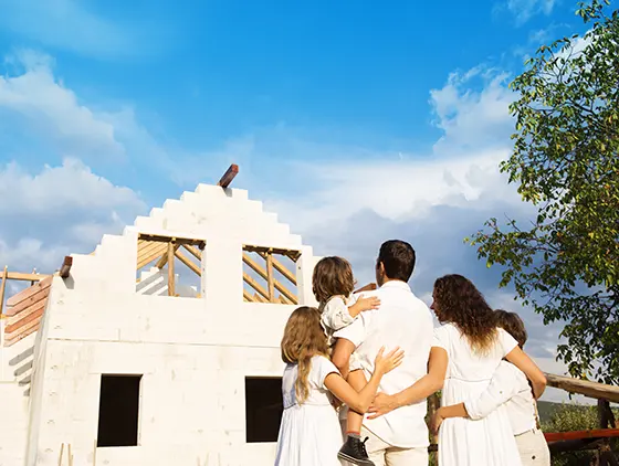 A family looking at their new home